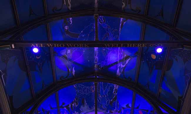 A curved ceiling decorated with painting