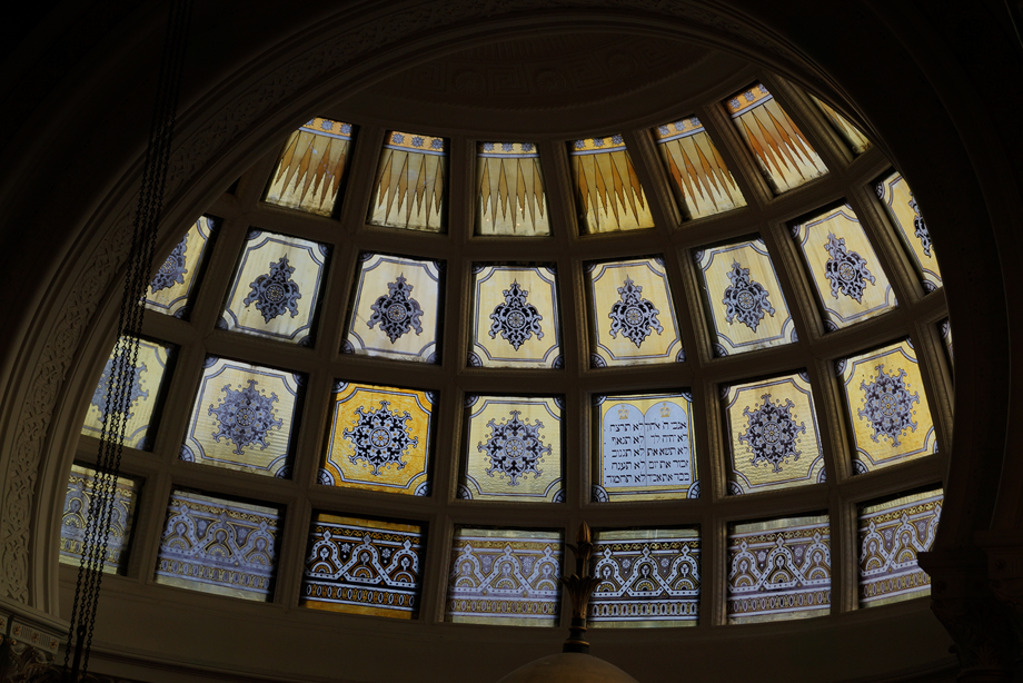 Lots of small windows painted with blue patterns and images. Reference no: 000-000-764-004-R