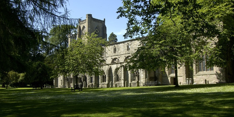 A photo of Dunkeld Cathedral on a sunny day