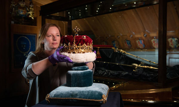 The Crown of Scotland being removed from the case for cleaning and conservation, by our Regional Collections Manager