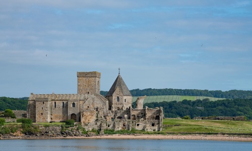 Distant view of Inchcolm Abbey across the sea