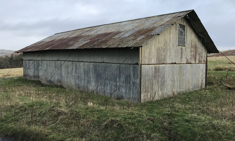 A corregated iron hut at an old military camp