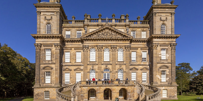 General view of the exterior of Duff House with clear blue skies.
