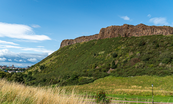 An image of Holyrood Park with Salisbury Crags in the background