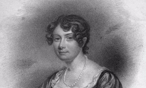 A pencil drawing of a person dressed in 19th Century ladies clothing and wearing a pearl necklace. They are looking at the viewer and smiling.