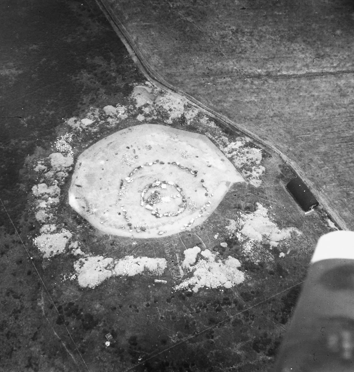 Aerial view of Cairnpapple Hill, black and white