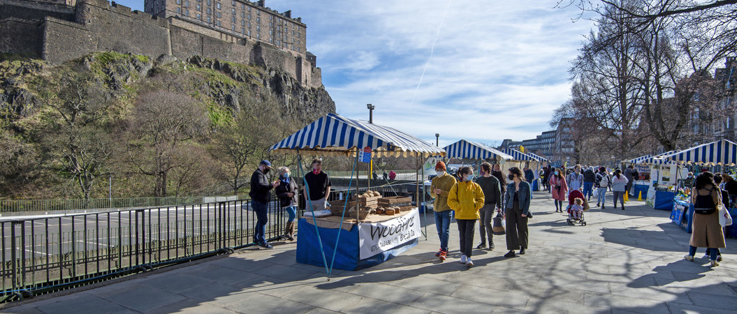 Market stalls on Castle Terrace with Edinburgh Castle above