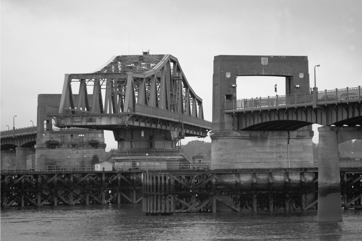 Black and white photo of Kincardine Bridge with swing section partially open
