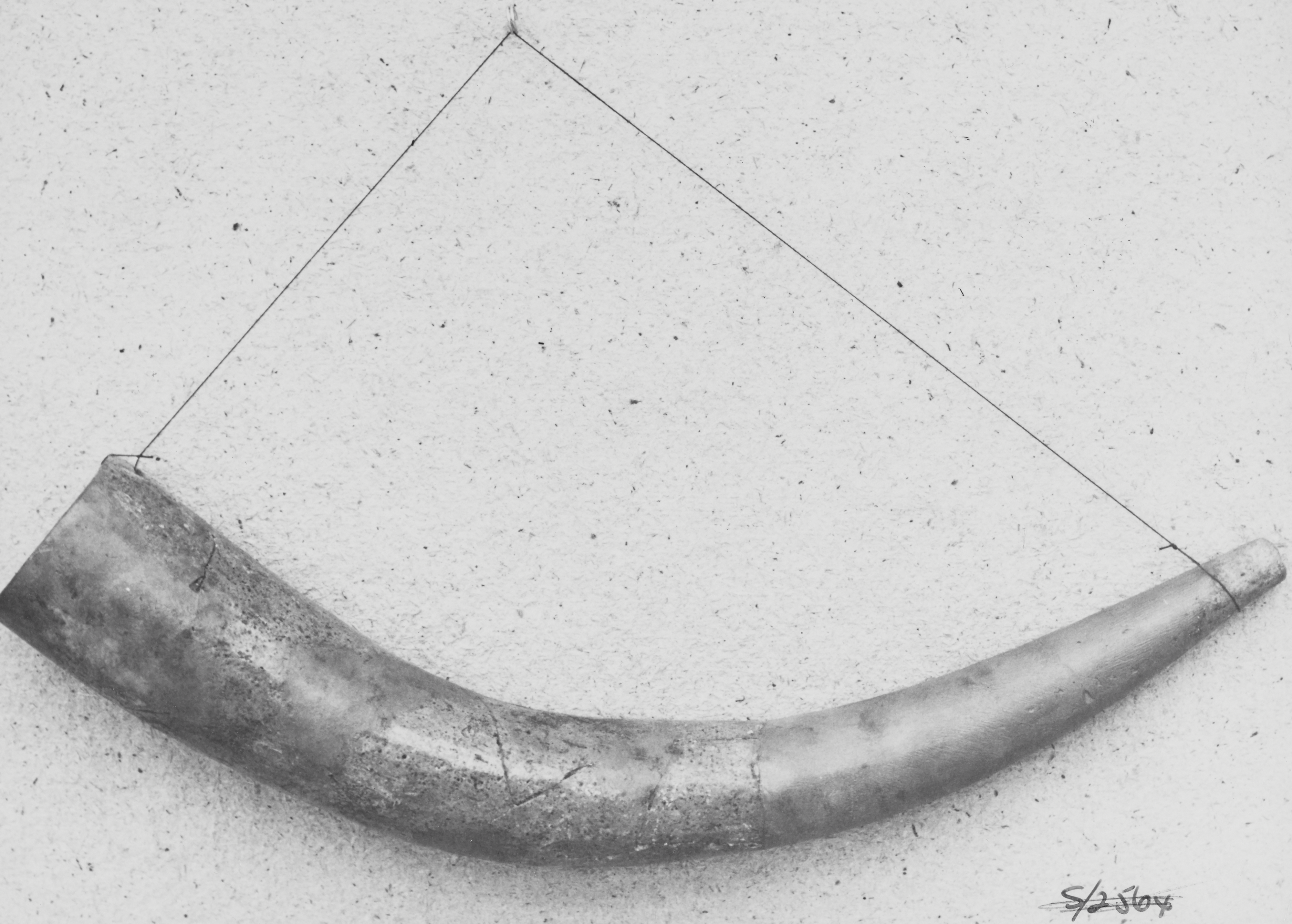 A horn-shaped piece of pottery