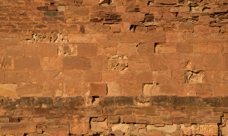 Close up of stonework, constructed from red sandstone 