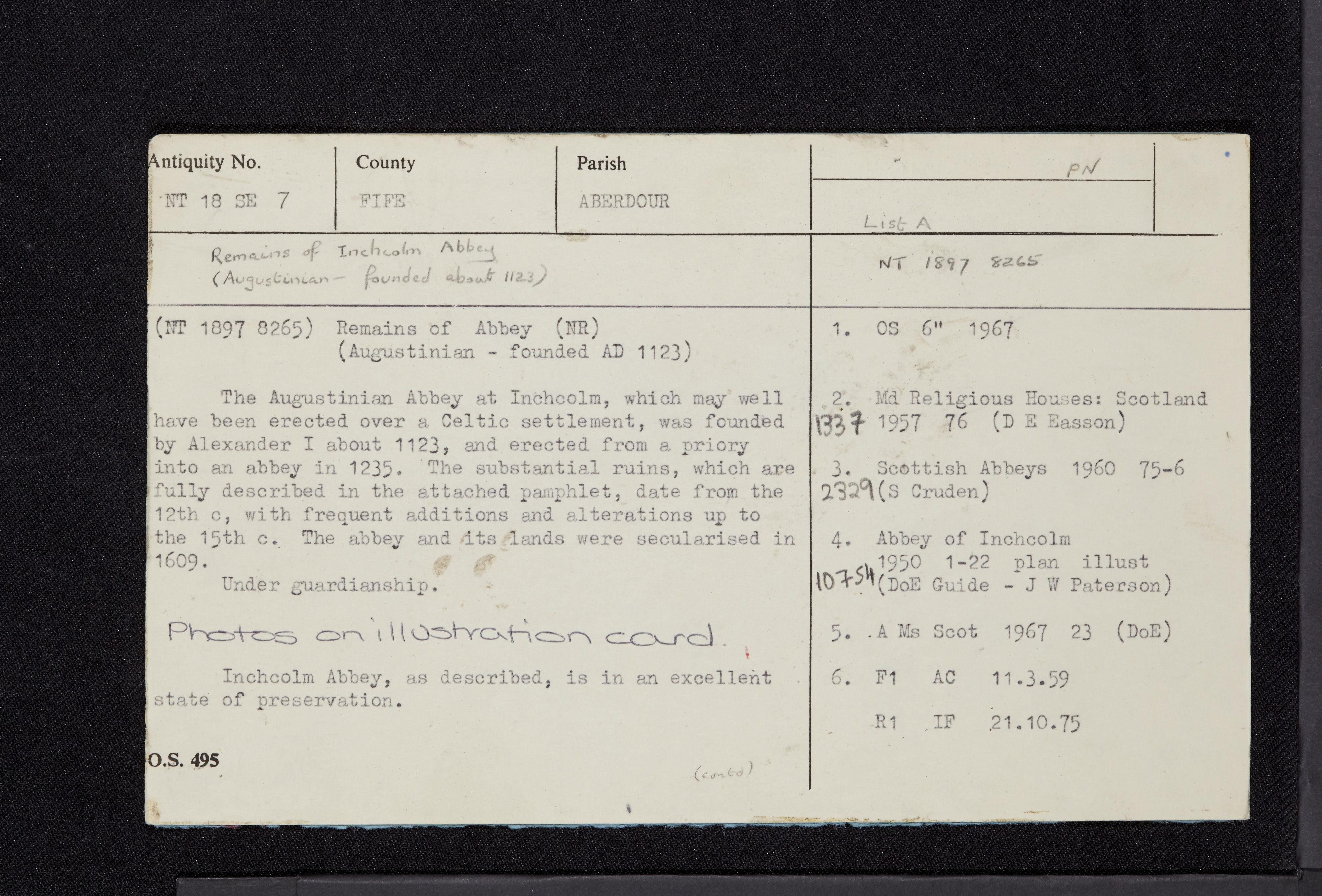 A historic record with handwritten and typed information about Inchcolm Abbey