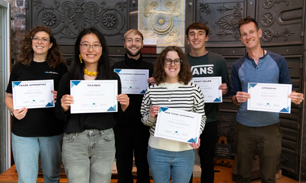 A group of Trainees, Apprentices and Craft Fellows with their awards 