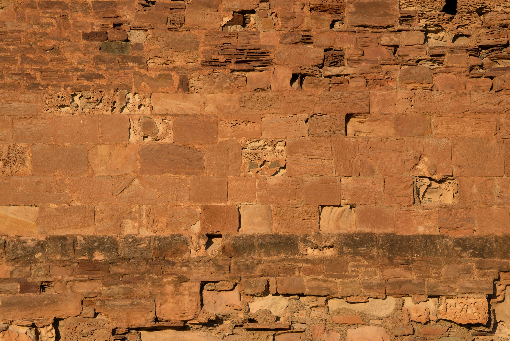 Close up of stonework, constructed from red sandstone 