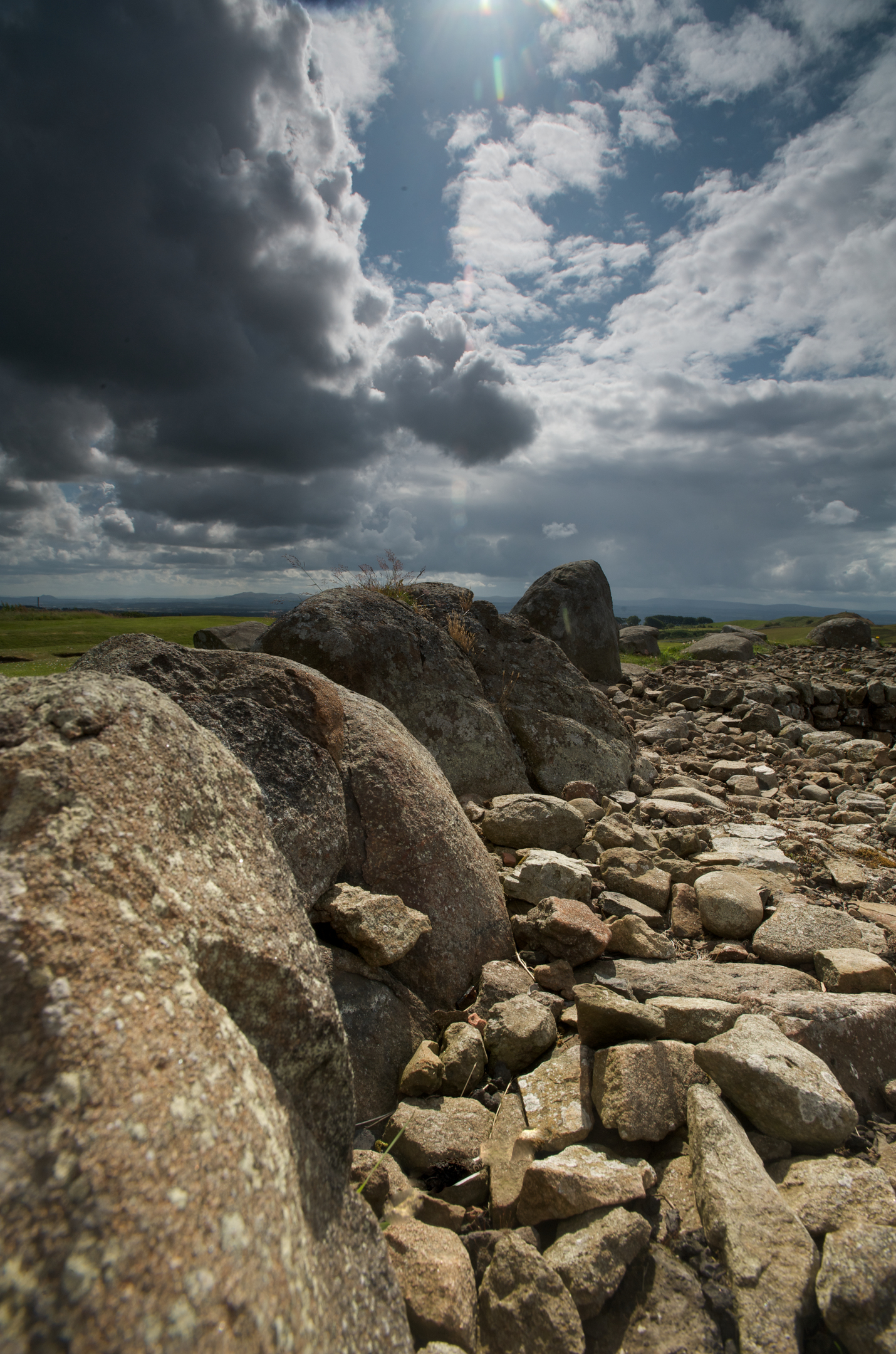 Rocks and stones and a cloudy sky
