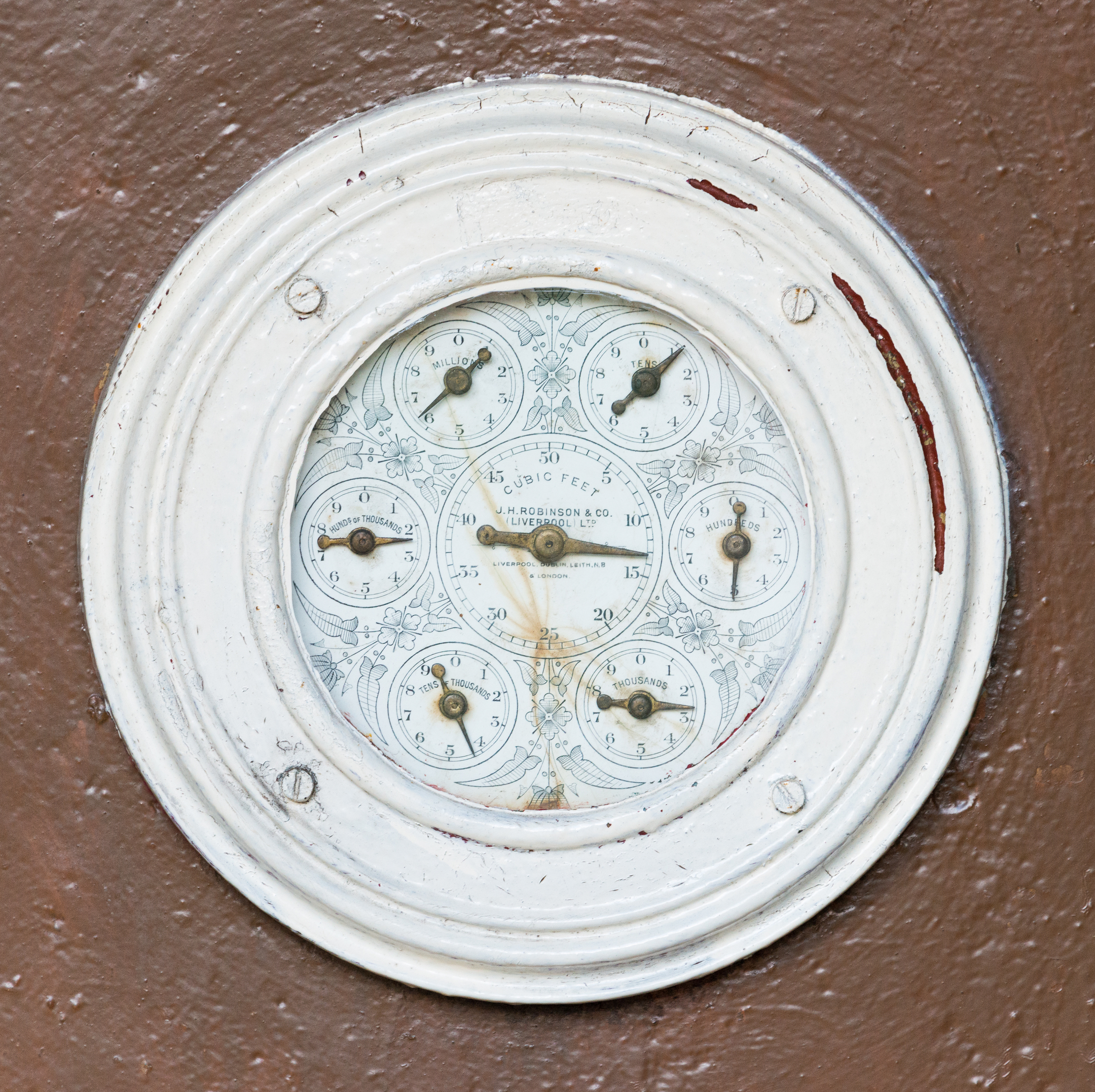 Close-up of a white dial on a machine at Biggar Gasworks