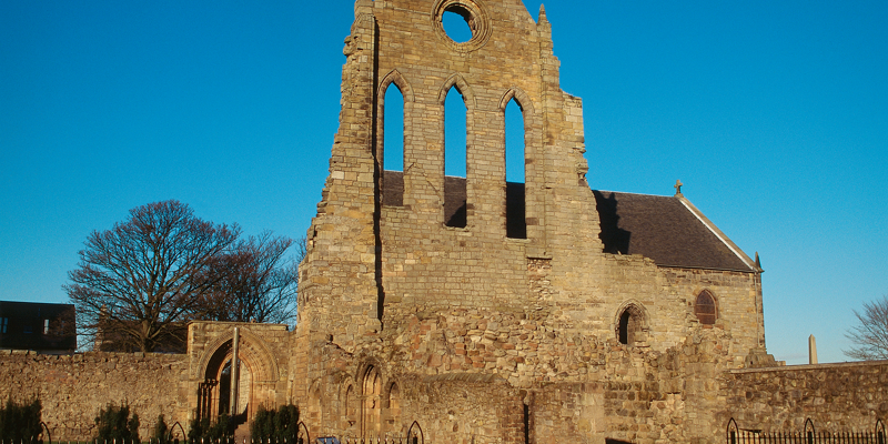 The outside of Kilwinning Abbey on a sunny day 